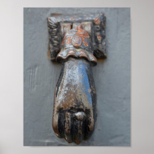 Brass hand door knocker poster