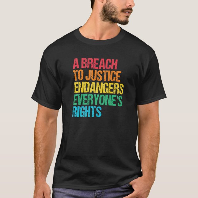 Breach Justice Endanger Rights Social Justice Huma T-Shirt (Front)