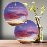 Breathtaking sunset over the sea, personalizable  ceramic tree decoration<br><div class="desc">This Ceramic Ornament features an amazing sunset by the sea. Wonderful cloudy evening sky in lavender,  pink,  yellow. Beautiful quote "A beautiful life is a collection of unforgettable moments". Beautiful gift idea for any woman!  Also a wonderful mother's day gift. Personalizable! Originalphoto by Marions Artwork.</div>