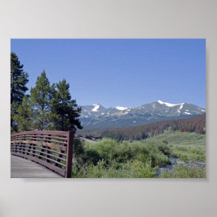 Breckenridge Bike Bridge and Snow Capped Mountains Poster