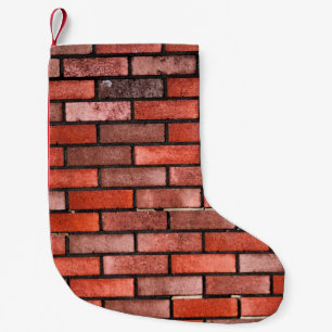 Brick wall with red brick, red brick background. b small christmas stocking