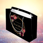 Bridal Shower black florals burgundy Large Gift Bag<br><div class="desc">A trendy and stylish Bohemian boho style for a bridal shower. Decorated with watercolored roses in burgundy and pink. Elegant black coloured background. A faux gold geometric frame. Templates for the bride's name and a date. With the text: Bridal Shower written with a hand lettered style script, faux gold coloured...</div>