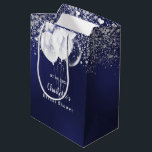 Bridal Shower navy blue white glitter balloons Medium Gift Bag<br><div class="desc">A navy blue background decorated with glitter sparkles and balloons.  The blue colour is uneven. Personalise and add a date,  name. The text: The name is written in white with a modern hand lettered style script</div>