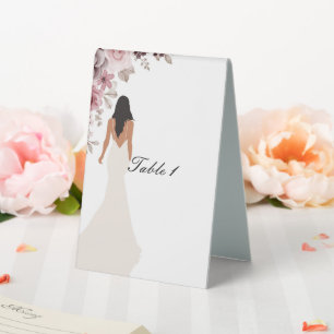 bridal shower sign with pretty flowers and a bride