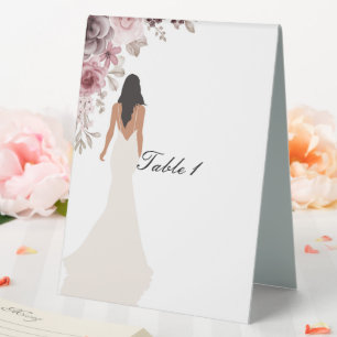 bridal shower sign with pretty flowers and a bride