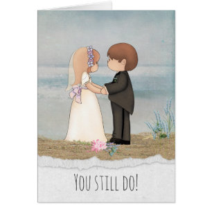 bride and groom on beach anniversary