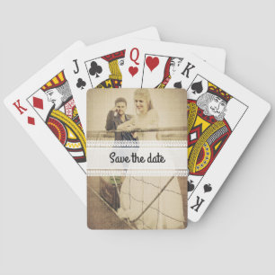 Bride and groom playing cards