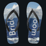 Bride Groom Ocean Waves Blue Sky Flip Flops<br><div class="desc">My Original Photography & Graphic Design. One-of-a-kind Bride Groom flip flops custom designed. Pretty Blue Sky with Fluffy White Clouds, Blue Sea and White Foam Ocean Waves. Unisex Flip Flops with Bride and Groom written in a silver colour text, and Date of Marriage in darker grey text. PERSONALIZE with your...</div>