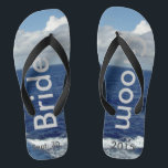 Bride Groom Ocean Waves Blue Sky Flip Flops<br><div class="desc">My Original Photography & Graphic Design. One-of-a-kind Bride Groom flip flops custom designed. Pretty Blue Sky with Fluffy White Clouds, Blue Sea and White Foam Ocean Waves. Unisex Flip Flops with Bride and Groom written in a silver colour text, and Date of Marriage in darker grey text. PERSONALIZE with your...</div>