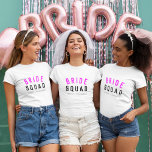 Bride Squad | Hot Pink Bachelorette Bridesmaid T-Shirt<br><div class="desc">Cute, simple, stylish "Bride Squad" quote art womens t-shirt with modern, minimalist typography in black and hot neon pink in a cool trendy style. The slogan, name and role can easily be personalised with the names of your bridal party, for example, bride, bridesmaids, flower girls, Mother of the Bride, Glam...</div>