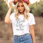 Bride to Be Black Modern Script Custom Wedding T-Shirt<br><div class="desc">Modern and casual chic black calligraphy script "Bride to Be" women's bridal wedding tee shirt features custom text that can be personalised with the bride's first name. Perfect for the bride to wear at the bachelorette party and the wedding weekend!</div>