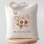 Bridesmaid | Boho Floral Bachelorette Party Name Tote Bag<br><div class="desc">Elevate your everyday style with this stunning Boho Wildflower Bouquet Tote Bag. Featuring a hand-drawn botanical arrangement in warm terracotta, burnt orange, and soft cream tones, this tote captures the essence of rustic elegance. The minimalist typography allows you to add a custom name for a truly unique touch. Perfect as...</div>