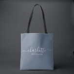 Bridesmaid Gift Dusty Blue  Tote Bag<br><div class="desc">This Bridesmaid accessory bag features a handwritten white script typography with swashes on a slate blue background. Present your bridesmaids with a tote bag for their small items. Traditionally presented at the rehearsal dinner,  for use in the early morning before the wedding.</div>