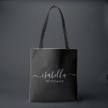 Bridesmaid Gift Personalised Black Tote Bag<br><div class="desc">This Bridesmaid accessory bag features a handwritten white script typography with swashes on a black background. Present your bridesmaids with a tote bag for small items traditionally presented at the rehearsal dinner,  for use in the early morning before the wedding.</div>