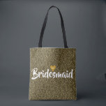 Bridesmaid Glitter Gold Heart Personalised Tote Bag<br><div class="desc">Personalise the name within the gold heart to create your own unique special memories. Featuring a trendy script text and a cute gold date heart. Ideal for Bridesmaids,  Maid of Honour,  Mother of the Bride etc. Designed by Pure Piglet© at www.zazzle.com/purepiglet*.</div>