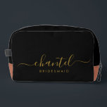 Bridesmaid Modern Gold Script Black Dopp Kit<br><div class="desc">This Bridesmaid accessory bag features a handwritten gold script typography with swashes on a black background. Present your bridesmaids with a toiletry bag for their makeup and small items traditionally presented at the rehearsal dinner,  for use in the early morning before the wedding.</div>