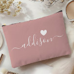 Bridesmaid Modern Script Dusty Rose Heart Accessory Pouch<br><div class="desc">This elegant accessory pouch features a stylish dusty rose background adorned with a modern script font displaying a personalised name and a charming heart design. The soft, feminine colour and sophisticated typography make it a perfect accessory for bridesmaids or anyone who appreciates chic and trendy designs. Its versatile use and...</div>
