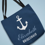 Bridesmaid Navy Nautical Anchor Custom Wedding Tote Bag<br><div class="desc">Custom wedding tote bag features a boat anchor with custom text that can be personalised with the name and role of the person in your bridal party. A pattern of red,  cloud blue,  grey,  and white anchors appears on the back side. The navy blue background colour can be customised.</div>