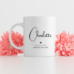 Bridesmaid Wedding Simple Modern Script Name Coffee Mug<br><div class="desc">Bridesmaid Wedding Simple Modern Calligraphy Script Personalised Name Coffee Mug features your bridesmaid's name in elegant black calligraphy script accented with a simple love heart with the addition of your custom text such as the date and bridemaid. Text and heart colours can be adjusted in the editor to suit your...</div>