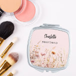 Bridesmaid wildflowers pink beige cream compact mirror<br><div class="desc">A blush pink background. Decorated with wildflowers in beige,  cream and pink.  Personalise and add your bridesmaid's name.   Black handwritten style script.</div>