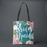 Bridesmaids Brushed Floral Wedding Party Tote Bag<br><div class="desc">Custom colour background and all over printing with painted floral edges. Bridesmaid in brush script on one side and name on the back. Customise to change the background colour (turquoise). Black looks amazing too. The gorgeous painted florals are by Create the Cut. Find them on Creative Market https://crmrkt.com/7WdAX, Etsy https://www.etsy.com/shop/CreateTheCut,...</div>