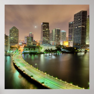 Bridge leads across waterway to downtown Miami Poster