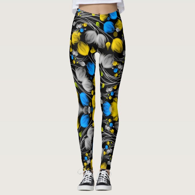 Bright abstract floral pattern on black background leggings (Front)