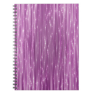 Bright abstract pink background with glitter notebook