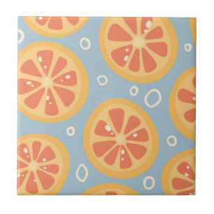 Bright and Bold Orange Slices Pattern on Blue Tile