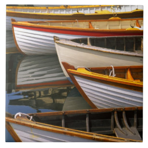 Bright coloured boats at the Wooden Boat Centre Tile