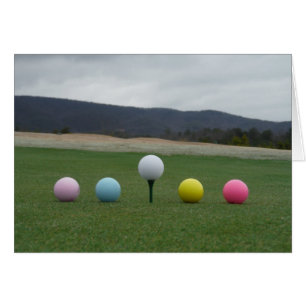 bright coloured Golf Balls on a mountain