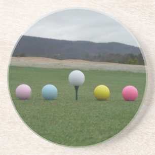 bright coloured Golf Balls on a mountain Coaster