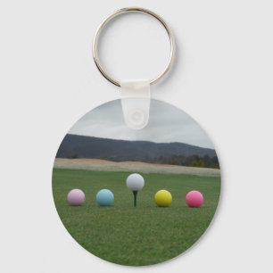 bright coloured Golf Balls on a mountain Key Ring