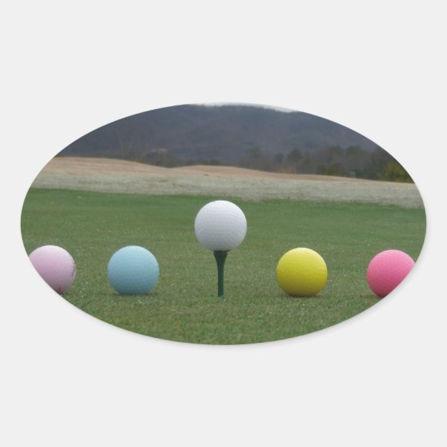 bright coloured Golf Balls on a mountain Oval Sticker (Front)
