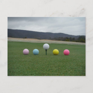 bright coloured Golf Balls on a mountain Postcard