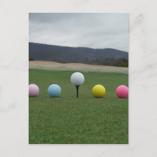 bright coloured Golf Balls on a mountain Postcard