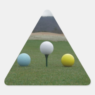 bright coloured Golf Balls on a mountain Triangle Sticker