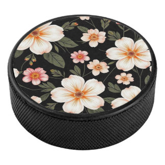 Bright floral pattern on black hockey puck