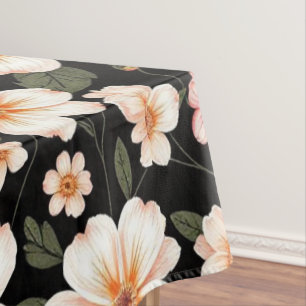 Bright floral pattern on black tablecloth