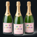 Bright & Joyful Merry Christmas Blush Pink Sparkling Wine Label<br><div class="desc">Send your holiday greetings with this Wine Label that radiates cheerful and festive spirit. Customise it by clicking the "Personalise" button. Featuring colourful "Merry Christmas" text, this design adds a touch of joy and fun to your holiday message. Perfect for anyone seeking a chic and vibrant way to spread holiday...</div>
