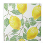 Bright Lemons and Leaves Yellow and Green Tile<br><div class="desc">Cute and Bright decorative ceramic tile with a lovely lemons and leaves print. Perfect to bring a bit of summertime in any season! Matching products are available in my collections. Do not hesitate to contact me for any custom request.</div>