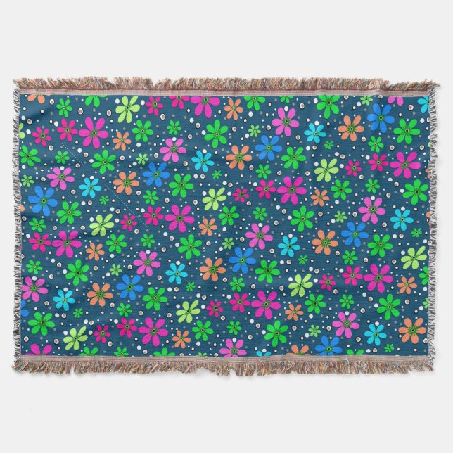 Bright multi-coloured chamomile flowers on a blue  throw blanket (Front)