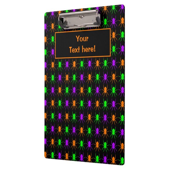 Bright multi spiders on black clipboard (Left)