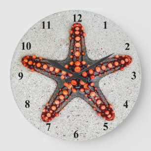 Bright Orange Red Starfish on White Sand Large Clock