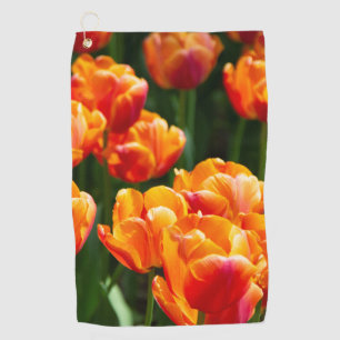 Bright orange tulips in the park   golf towel