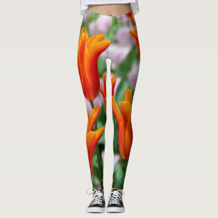 Bright orange tulips in the park leggings