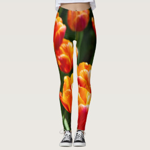 Bright orange tulips in the park leggings