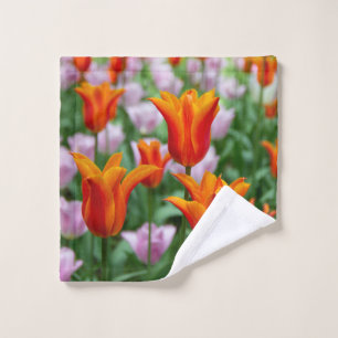 Bright orange tulips in the park wash cloth