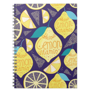 Bright pattern of lemons and cloves on a dark blue notebook