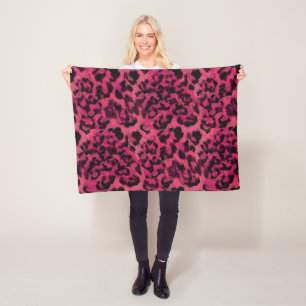 Bright pink and black spotted leopard fleece blanket